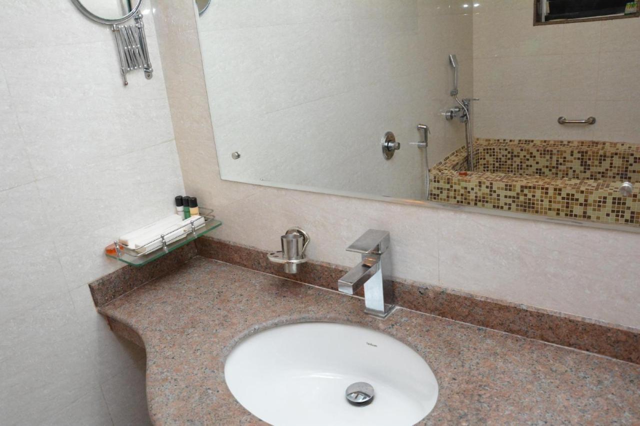 Boshan Hotels Мапуса Экстерьер фото
