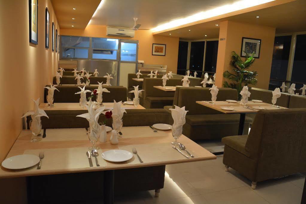 Boshan Hotels Мапуса Экстерьер фото