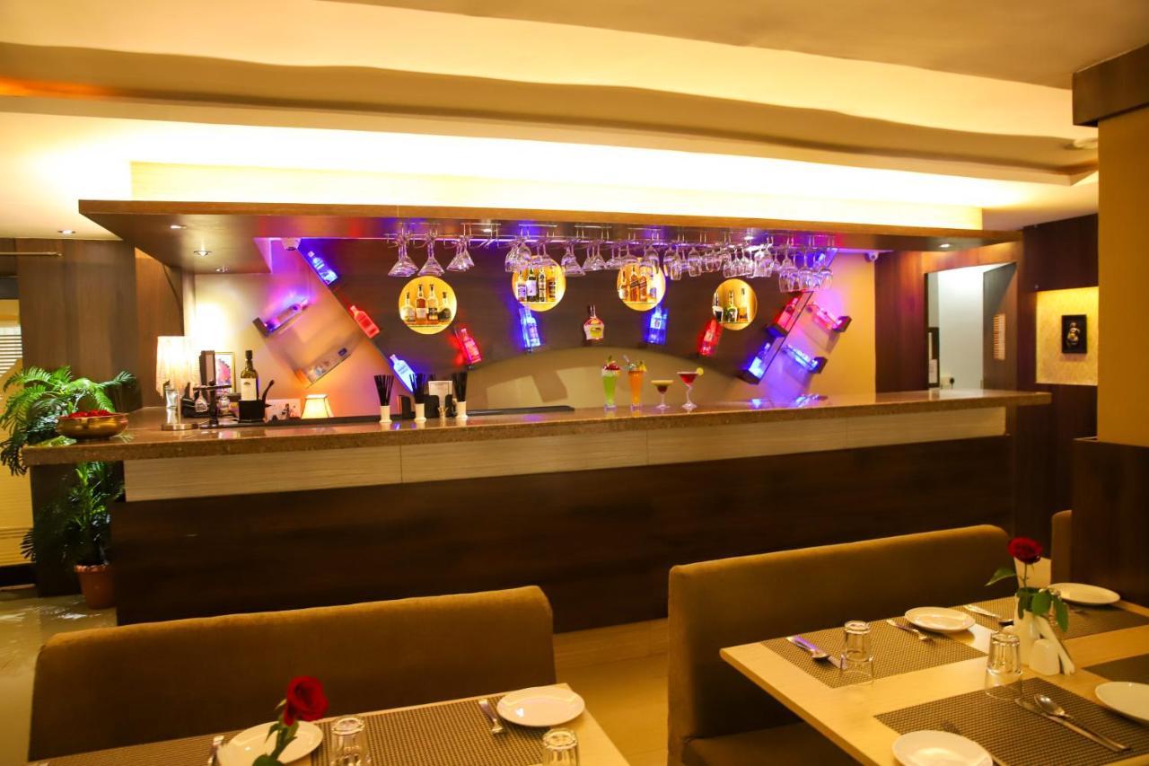 Boshan Hotels Мапуса Экстерьер фото